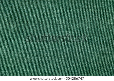 Texture background of green jeans