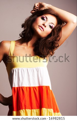 Fashion girl posing on light background