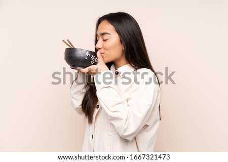 Similar – Image, Stock Photo Young female eating noodles and watching TV