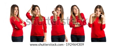 young girl making horn gesture and thinking over white background