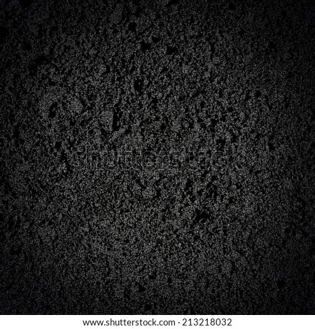 Black rough textured wall. Background.