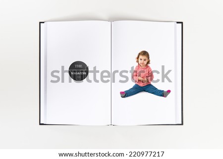 Cute girl sitting printed on book