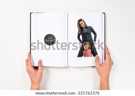 mother and daughter playing together printed on book