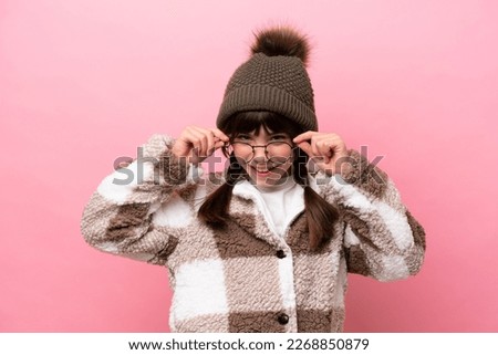 Similar – Image, Stock Photo Little Caucasian Girl in costume of which orange and black color and celebrating Halloween outdoor