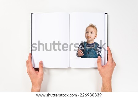 Kid eating biscuits printed on book