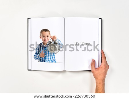 Boy holding an antique clock printed on book