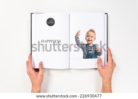 Cute blonde kid smiling printed on book
