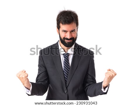 Lucky businessman over isolated white background