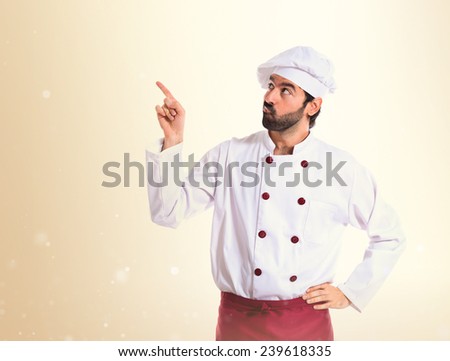 Chef thinking over ocher background
