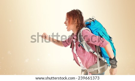 backpacker running fast over white background