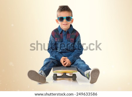 Kid playing with skate board