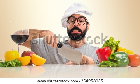 Crazy hipster chef cutting his finger