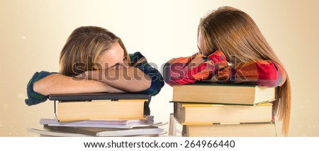 Tired students over ocher background