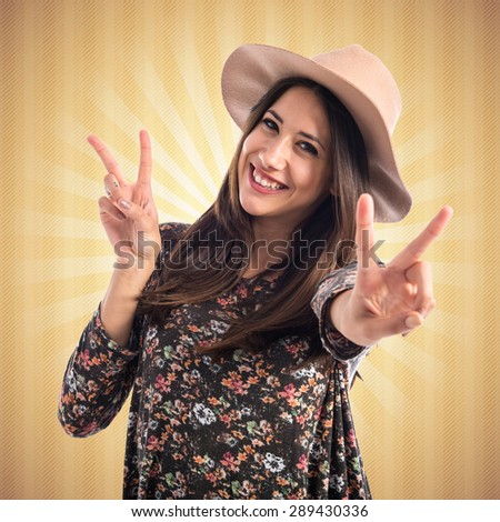 woman doing victory gesture