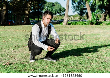 Similar – Image, Stock Photo Pensive man playing ukulele guitar