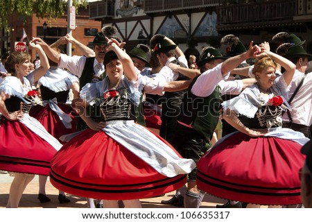 LEAVENWORTH, WA - MAY 12: A group of dancers perform German folk dance on front street during a 40 Th annual Mai-fest celebration in Leavenworth, Washington, USA