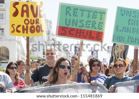 THESSALONIKI, GREECE - SEPT 18: Greek teachers on strike and protesting against job transfers and layoffs demanded by the country's international creditors on September 18,2013 in Thessaloniki,Greece.
