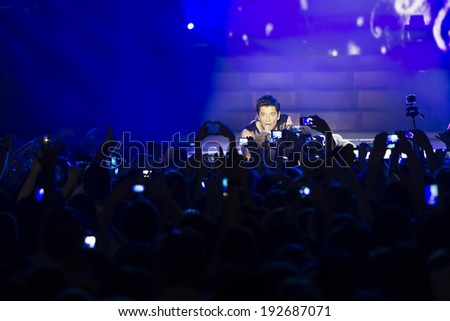 THESSALONIKI, GREECE, MAY 8 2014: Singer Sakis Rouvas performing live on stage for the Ace of Heart tour at Sports arena in Thessaloniki.