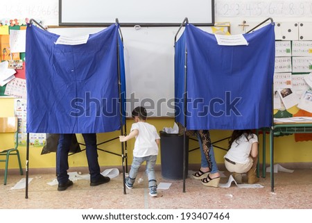 THESSALONIKI, GREECE, MAY 18, 2014: Highlights during the municipal and regional elections in Greece. 10 million Greeks are eligible to vote on Sunday to elect mayors and town councils.