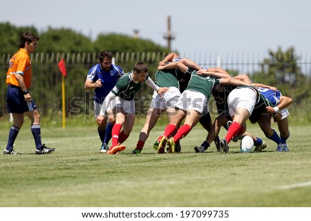 THESSALONIKI, GREECE- MAY 31, 2014: Rugby players pushing in a scrum during the match Greece vs Bulgaria for the European Championship Rugby, which took place in Thessaloniki, Greece.