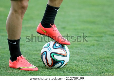 THESSALONIKI, GREECE- AUGUST 14 : Footballer\'s feet in action with a ball before the friendly match Paok vs Inter.