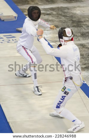 THESSALONIKI, GREECE - OCT 19, 2014 : Young athletes competing during the World Youth Fencing Championships 2014. Over 150 fencers from 25 countries took part at the championships.