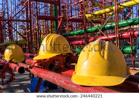 yellow hardhat on construction site