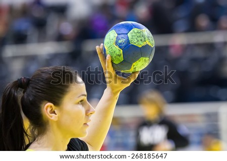 THESSALONIKI, GREECE, MARCH 27, 2015: Undefined hands holding a ball prior to the Greek Women Cup Final handball game  Paok vs Nea Ionia