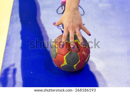THESSALONIKI, GREECE, MARCH 27, 2015: Unidentified hands holding a ball prior to the Greek Women Cup Final handball game  Paok vs Nea Ionia