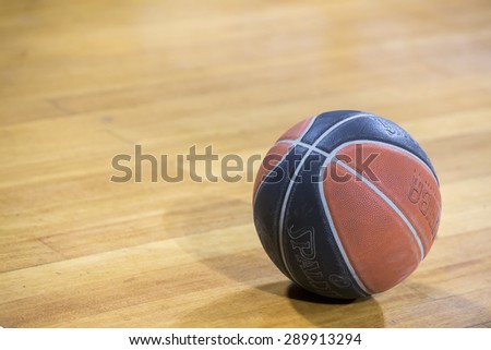 THESSALONIKI, GREECE,  JUN 17, 2015: Close-up of a baskeball on the ground during the Greek Basket League game Aris vs Paok