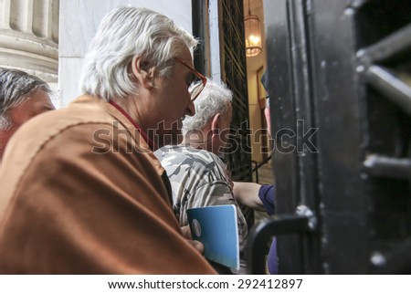 THESSALONIKI, GREECE, JULY, 1 2015: Pensioners queue outside a National Bank branch as banks only opened for the retired to allow them to cash up to 120 euros in Athens