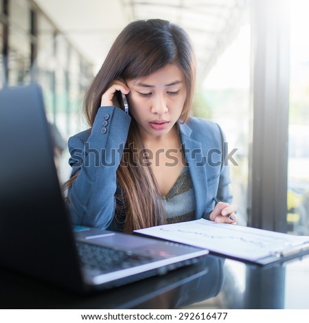 business woman working at her office. working time