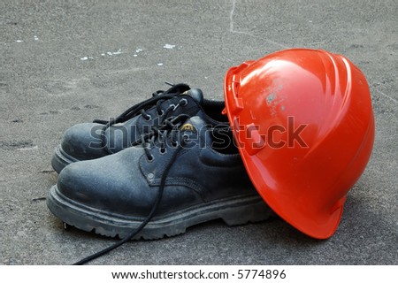 A Pair of Work Shoes and a Hard Hat