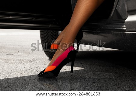 Sexual woman\'s legs in cute high heels outdoors