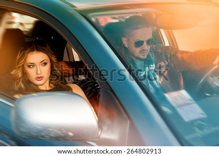 couple traveling by car at high speed. Inside car photo