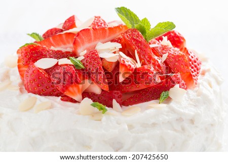 delicious cake with whipped cream and strawberries, close-up, horizontal