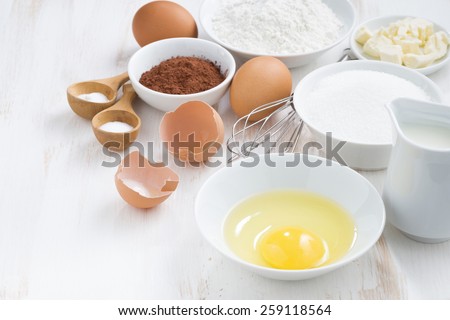 ingredients for baking on a white table, horizontal
