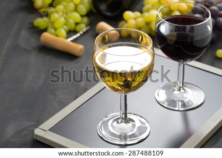 background with glasses of red and white wine, horizontal
