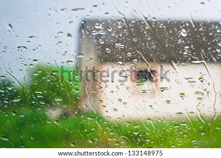 Rain behind a window, adverse weather conditions