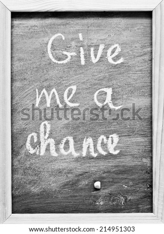 Give me a chance written with Chalk on Blackboard
