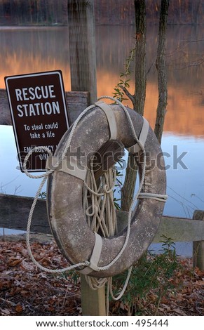 Old life saver with water background
