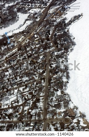 Aerial - Community with Lake and Water Tower