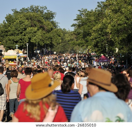ST PAUL, MN - AUGUST 23: Street full of people attending the Minnesota State Fair on August 23, 2008 in St Paul, Minnesota. The Minnesota State Fair first held in 1859, the year after statehood.
