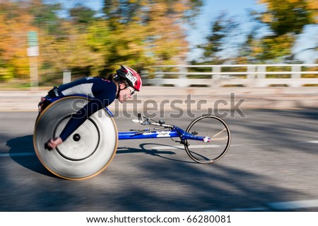 MINNEAPOLIS, MN - OCTOBER 3: Christina Ripp speeds by at Mile 19 and goes on to finish 1st in the Wheelchair Division of the 2010 Medtronic Twin Cities Marathon, October 3, 2010 in Minneapolis, MN