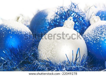 Blue and silver christmas balls isolated on a white background.