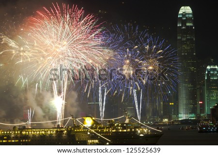HONG KONG - JANUARY 24:Lunar New Year Fireworks along Victoria Harbor in Hong Kong on 24 January, 2012. This is an annual event in Chinese New Year.