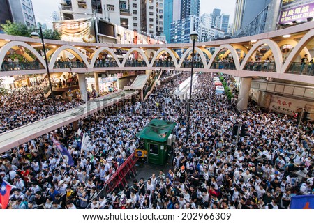 HONG KONG - JULY 1: Hong Kong people seek greater democracy as frustration grows over the influence of Beijing on July 1, 2014 in Hong Kong. Organizers of protest claimed a turnout of 510,000 people.
