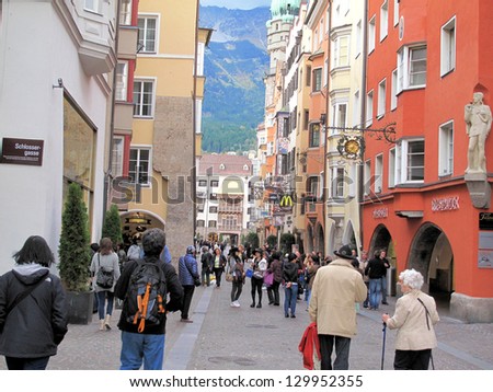 INNSBRUCK, AUSTRIA--OCTOBER 4--Visitors enjoy the shopping and history of the Austrian village of Innsbruck on October 4, 2010.  Innsbruck dated to the stone age.