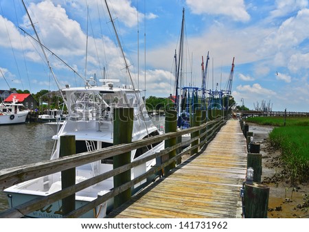 MOUNT PLEASANT, SOUTH CAROLINA-JUNE 8: People enjoy a beautiful June 8, 2013 and enjoy their boats and each other. Mount Pleasant is a large suburban town in Charleston County, South Carolina.