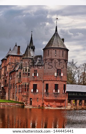 HAARZUILENS, NETHERLANDS-APRIL 15: An exterior view of Castle de Haar of the Netherlands on April 15, 2013. The current castle dates from 1892 in a restoration project funded by the Rothschild family.